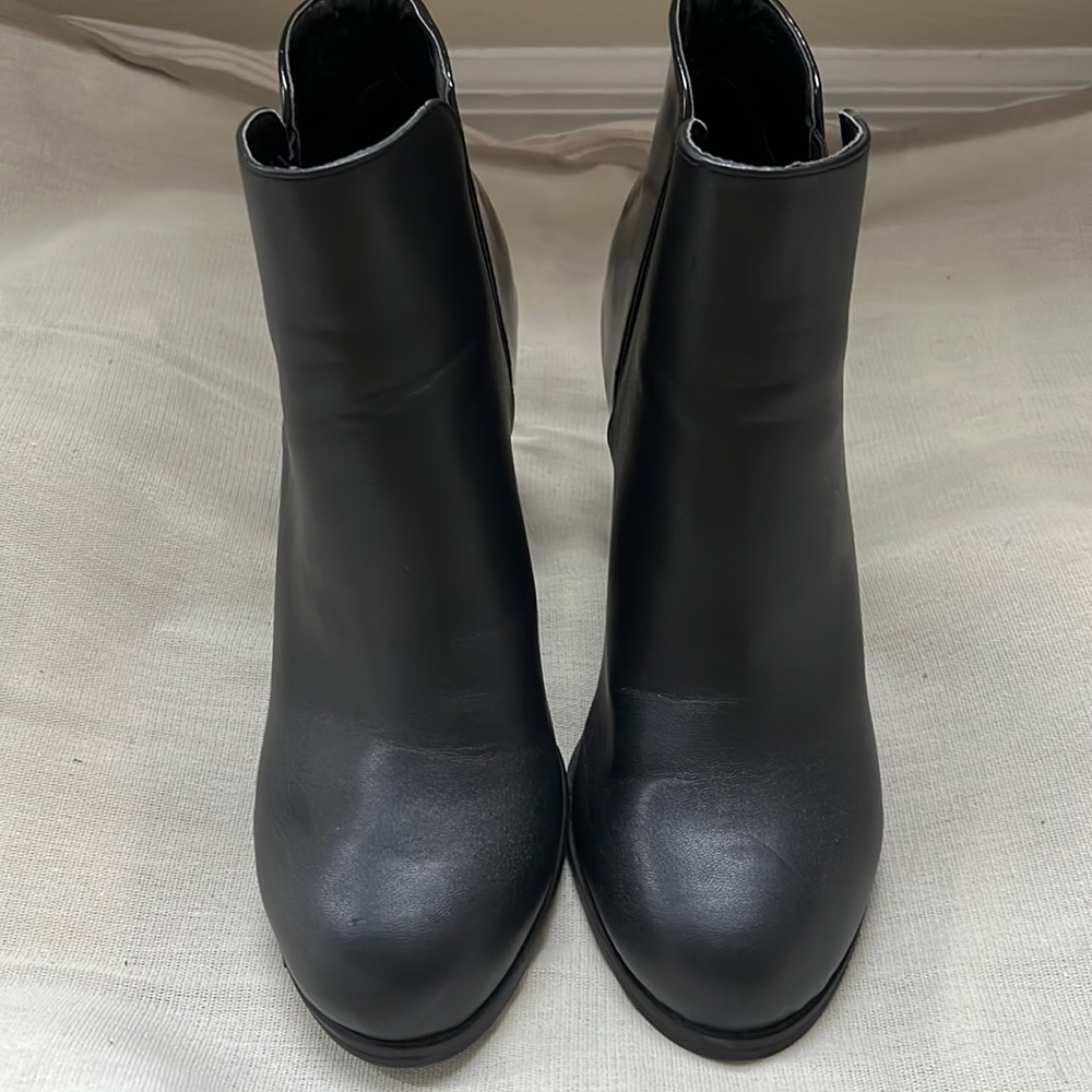 Black heeled ankle boots, slightly worn